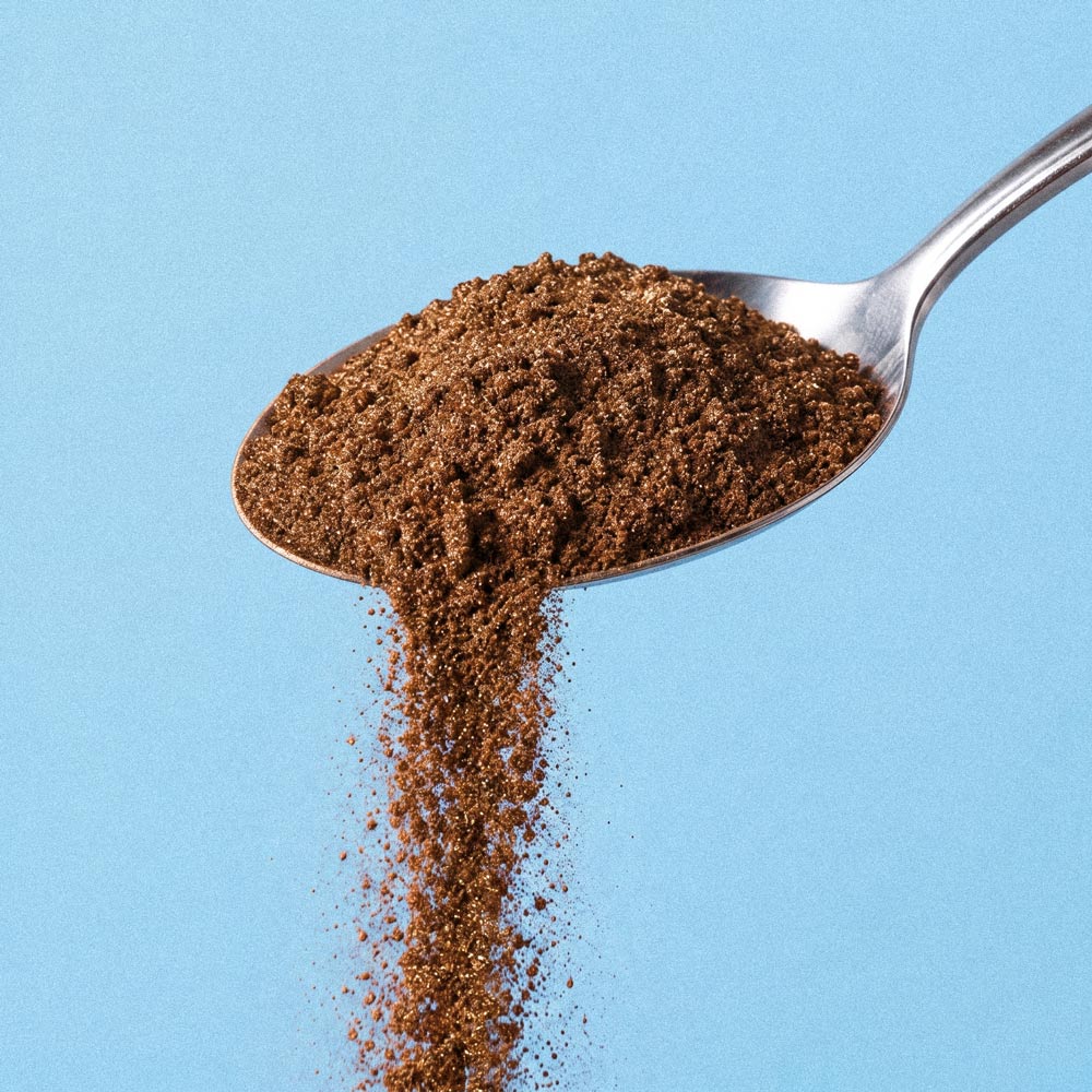 Spoonful of Syptual mushroom coffee powder